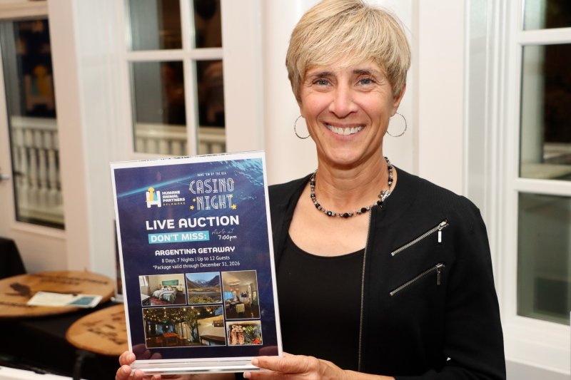 Dana MacElrevey was the high bidder in the live auction for a trip to Argentina.